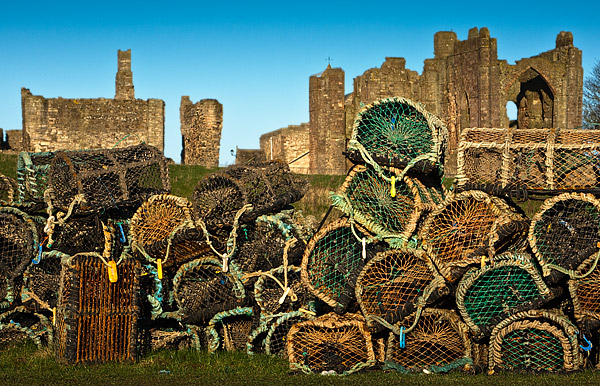 Lindisfarne Abbey with crab pots. Fine Art Landscape Photography by Gary Waidson