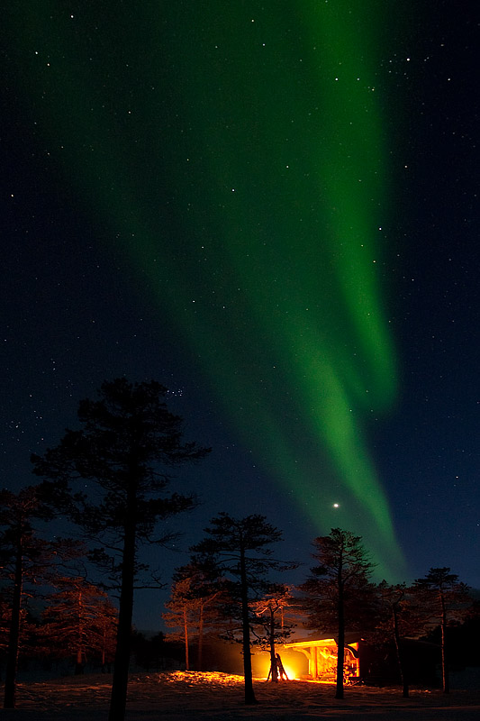 Northern-lights-over-Shelter-and-Fire